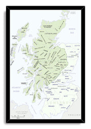 Scottish clans map wall art print in a black frame, with pale green territories, clan names, and surrounding seas.