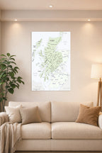 Historical Scottish Clans Map in a bright living room above a beige sofa.