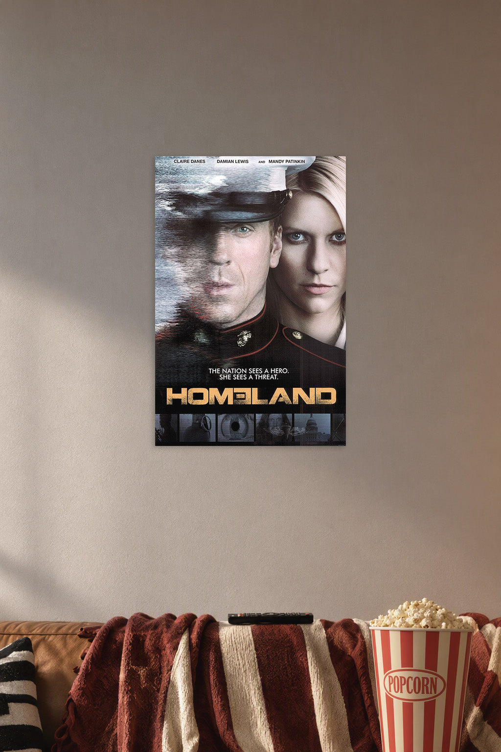 Homeland TV Series in a cozy movie room above a brown sofa with popcorn.