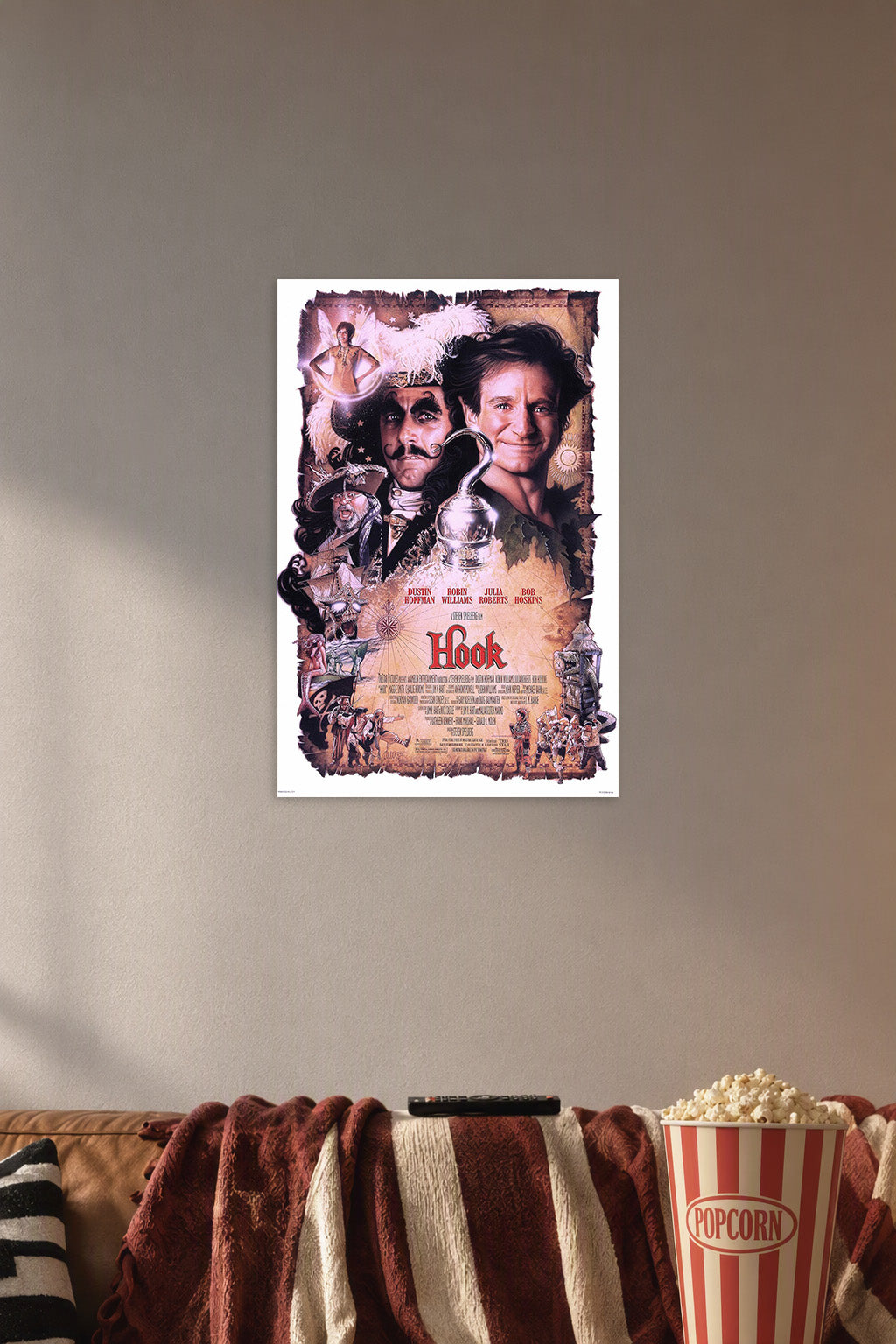 Hook Movie Poster in a cozy movie room above a brown sofa with popcorn.