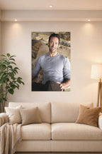 Hugh Jackman in a bright living room above a beige sofa.