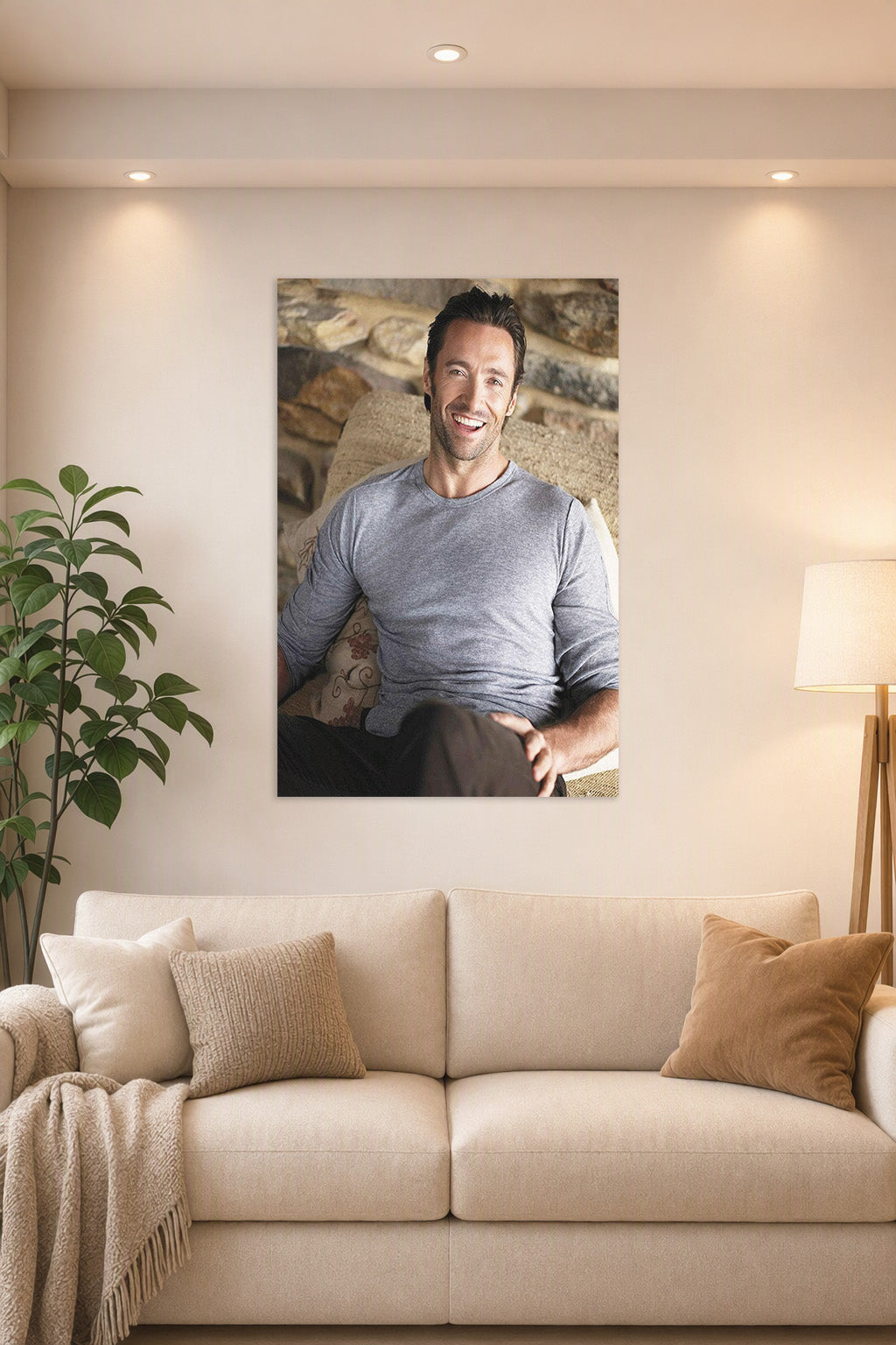Hugh Jackman in a bright living room above a beige sofa.