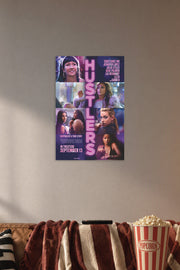 Hustlers Movie Cast in a cozy movie room above a brown sofa with popcorn.