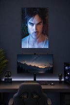 Ian Somerhalder in a gaming desk setup above a monitor.