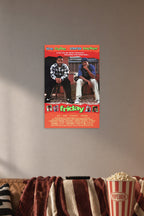 Ice Cube Chris Tucker Friday Movie in a cozy movie room above a brown sofa with popcorn.