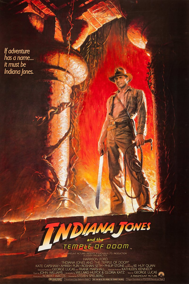 Indiana Jones and the Temple of Doom poster depicts the fedora-wearing hero with whip and machete before fiery ruins.