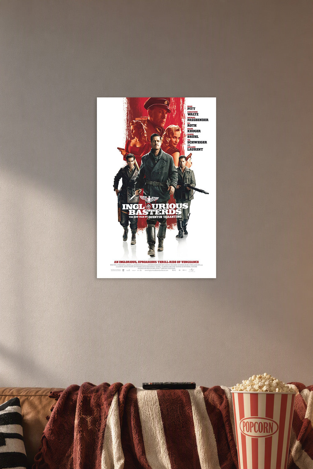 Inglourious Basterds Movie Poster in a cozy movie room above a brown sofa with popcorn.