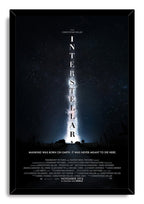 Interstellar framed wall art print displays a starry blue-black sky, bright central nebula, vertical title, and figures on a road.