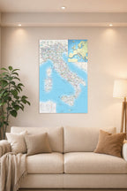 Italy Road Map in a bright living room above a beige sofa.
