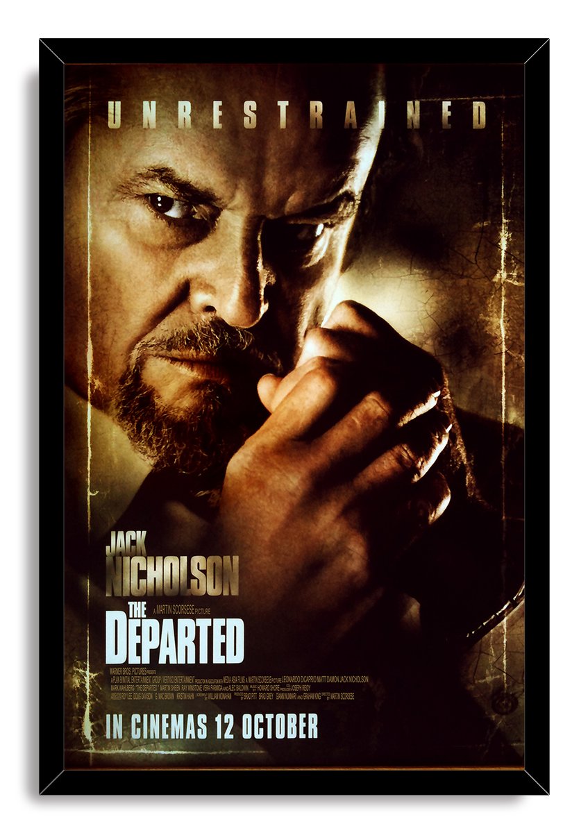The Departed framed wall art print presents Jack Nicholson in a shadowy sepia close-up, set in a black frame.
