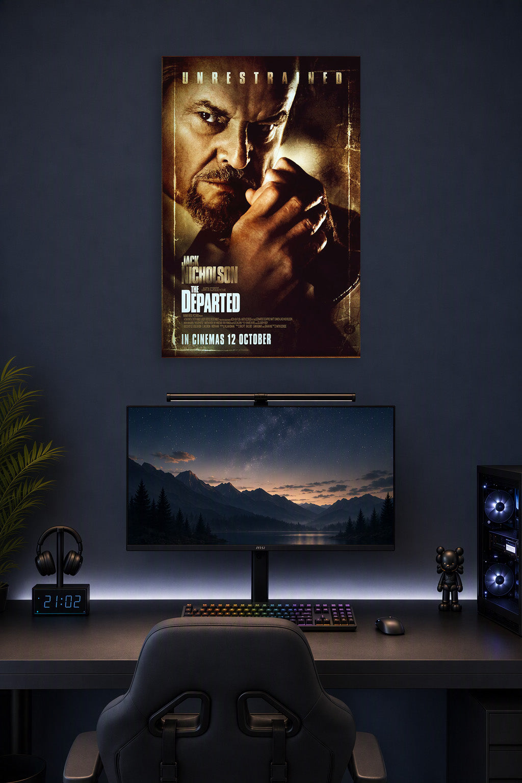 Jack Nicholson The Departed in a gaming desk setup above a monitor.