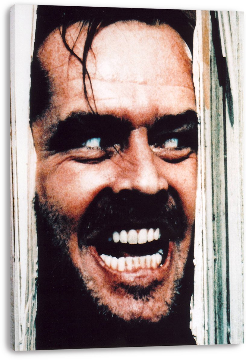 Jack Torrance canvas wall art print presents his wide-eyed, toothy grimace between weathered white door boards.