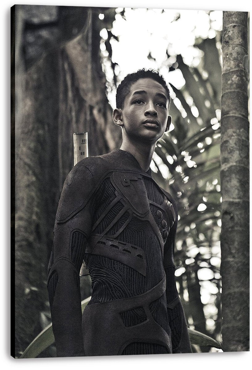 After Earth wall art print on a thick canvas, featuring Jaden Smith in a futuristic dark suit among dense green jungle foliage.