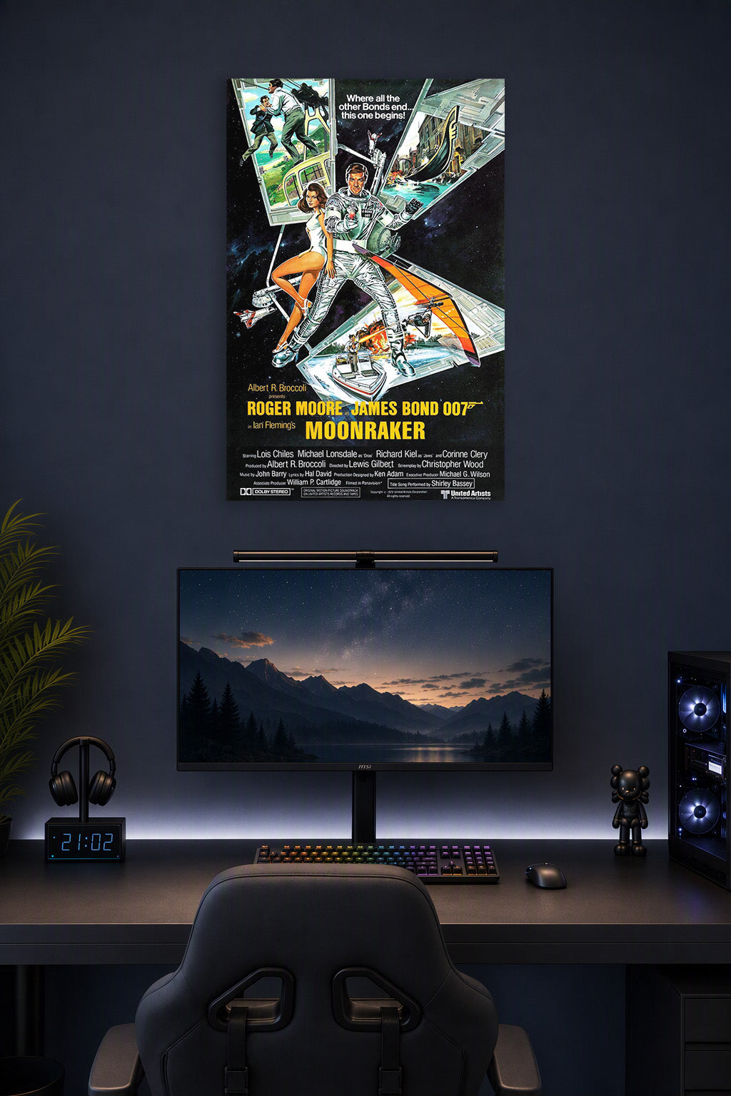 James Bond 007 Moonraker Roger Moore in a gaming desk setup above a monitor.