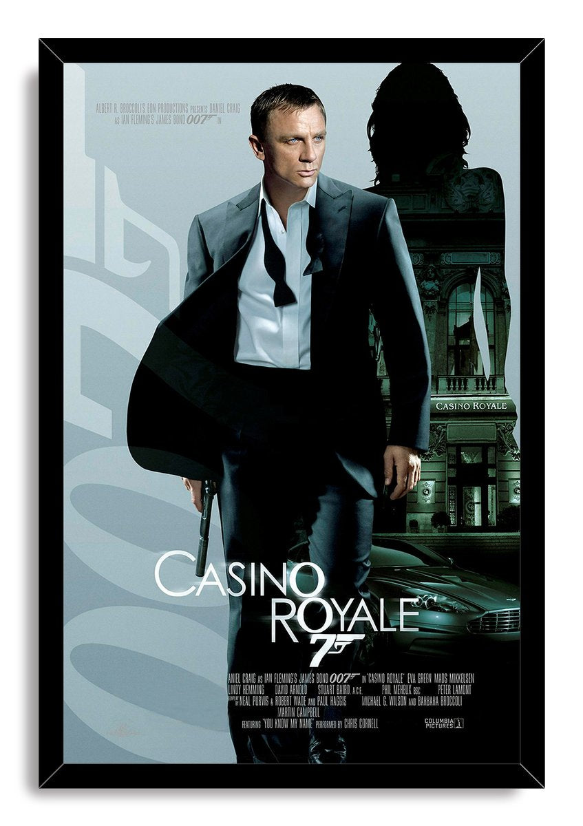 Casino Royale framed wall art print featuring Daniel Craig as James Bond with a pistol, casino building silhouette, and silver car.