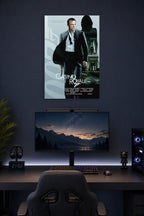 James Bond (Daniel Craig) Casino Royale in a gaming desk setup above a monitor.
