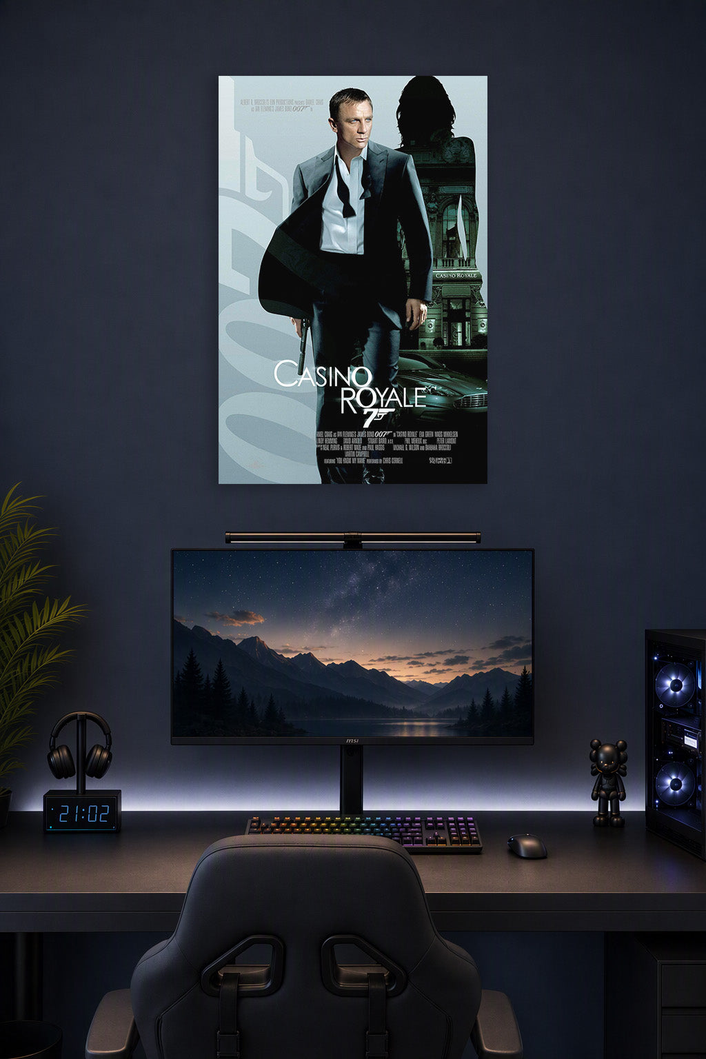 James Bond (Daniel Craig) Casino Royale in a gaming desk setup above a monitor.