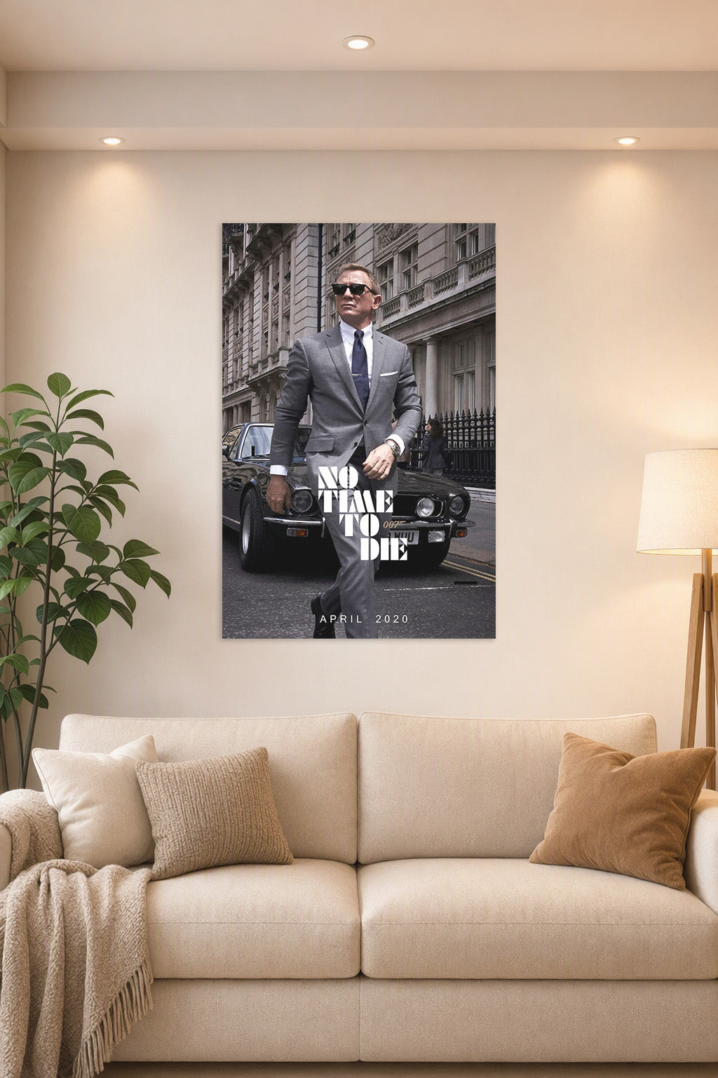 James Bond 'No Time To Die' in a bright living room above a beige sofa.