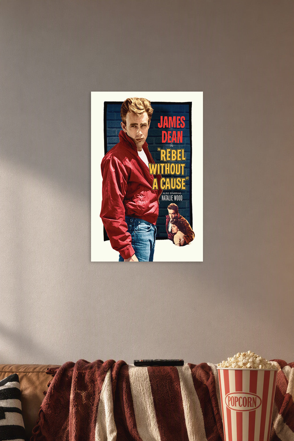 James Dean Rebel Without a Cause in a cozy movie room above a brown sofa with popcorn.
