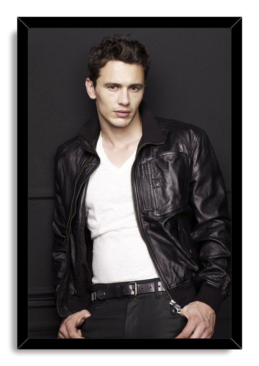 James Franco framed wall art print portrays the actor leaning against a charcoal wall in a leather jacket and white shirt.