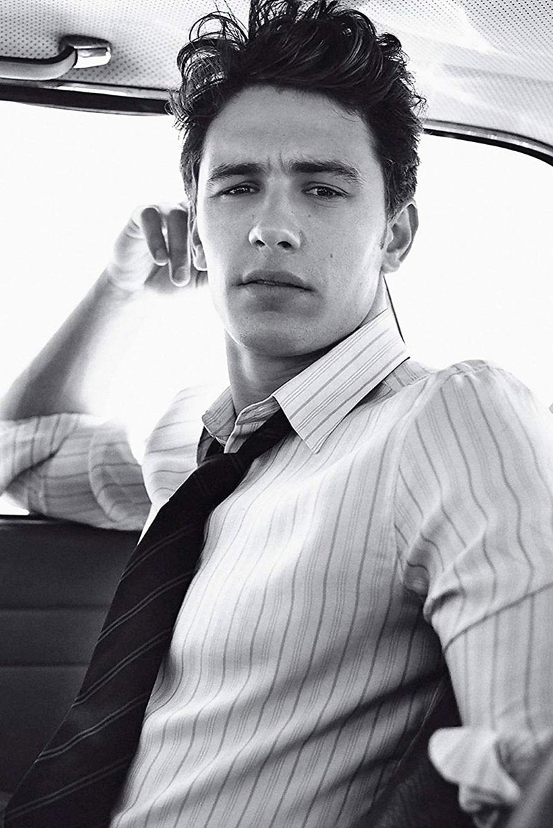 James Franco wall art print in black and white, seated in a car wearing a striped shirt and loosened dark tie.