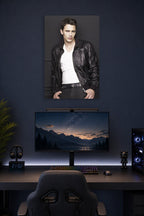 James Franco in a gaming desk setup above a monitor.