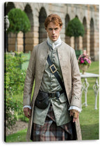 Jamie Fraser canvas wall art print displays a full-length portrait in period dress, set before stone arches, topiary, and flowers.