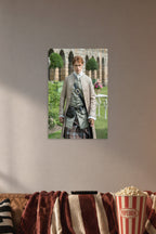 Jamie Fraser Outlander in a cozy movie room above a brown sofa with popcorn.