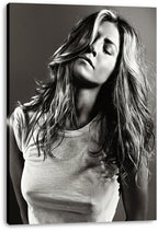 Jennifer Aniston canvas wall art print displays a monochrome portrait of her with flowing hair, closed eyes, and a white T-shirt.
