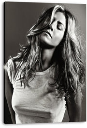 Jennifer Aniston canvas wall art print displays a monochrome portrait of her with flowing hair, closed eyes, and a white T-shirt.