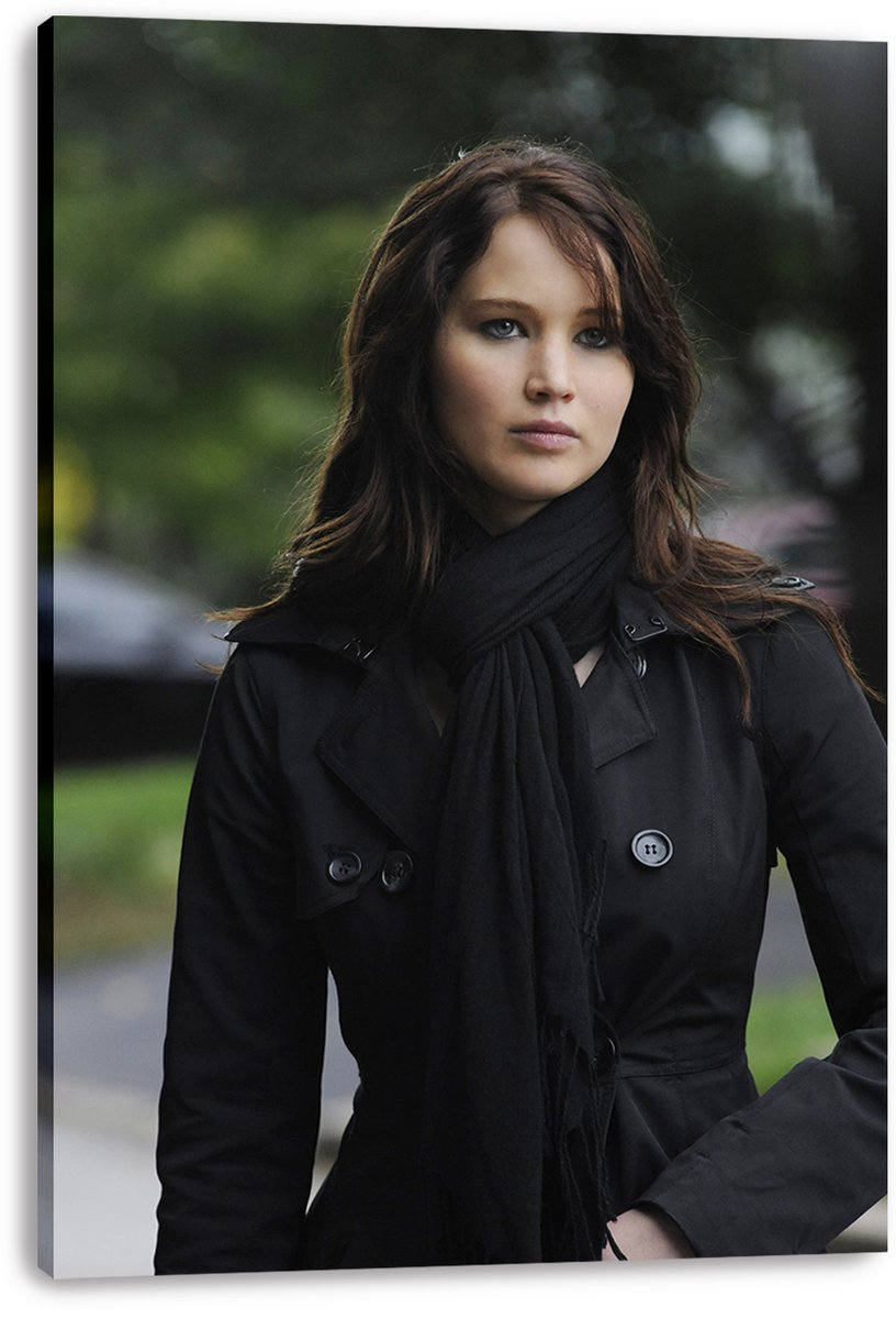 Jennifer Lawrence canvas wall art print featuring a close portrait in a black coat and scarf, displayed with wrapped canvas edges.