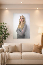 Jennifer Lawrence in a bright living room above a beige sofa.