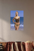 Jessica Alba in a cozy movie room above a brown sofa with popcorn.
