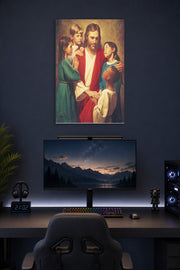Jesus with Children in a gaming desk setup above a monitor.