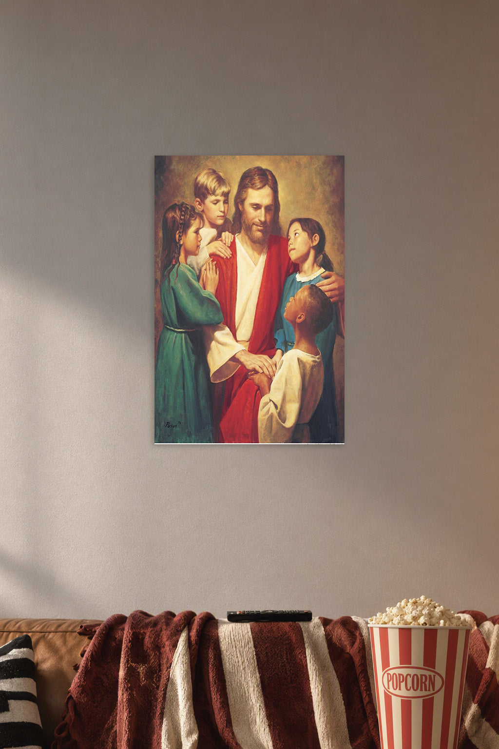 Jesus with Children in a cozy movie room above a brown sofa with popcorn.