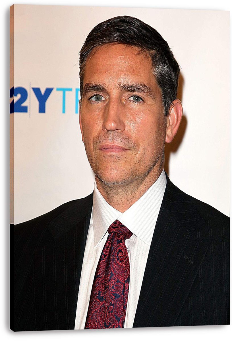 Jim Caviezel canvas wall art print featuring a formal close-up portrait in a black pinstripe suit and red patterned tie.
