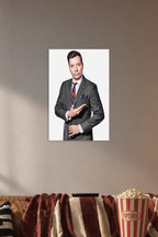 Jimmy Fallon in a cozy movie room above a brown sofa with popcorn.