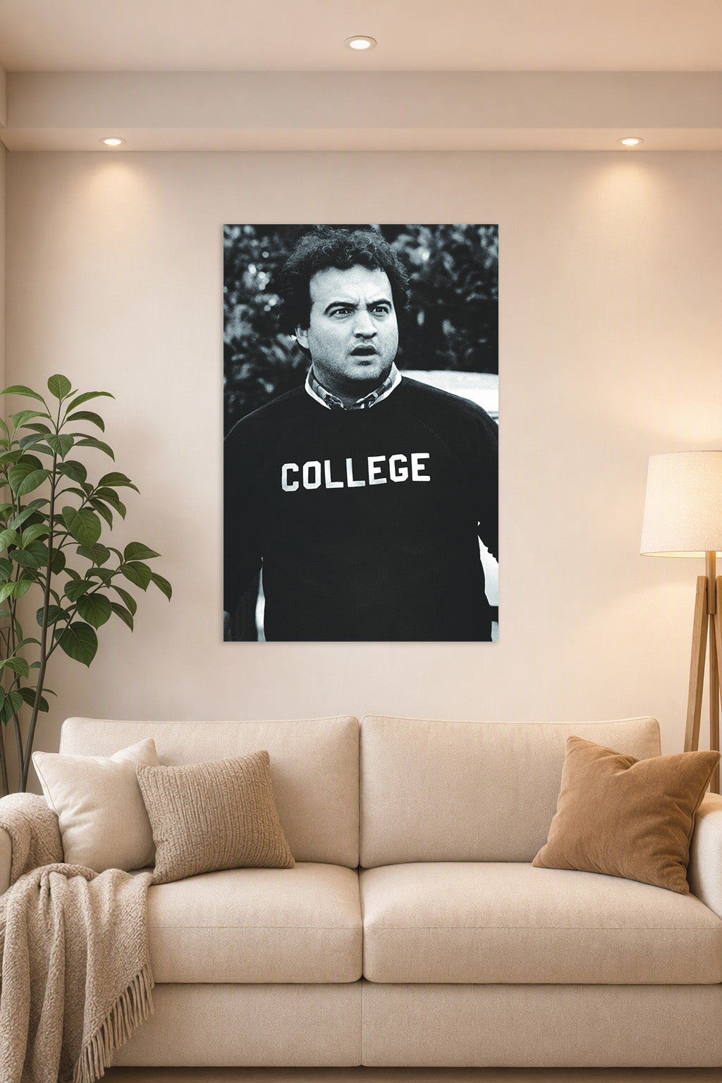John Belushi as Bluto Blutarsky from Animal House in a bright living room above a beige sofa.