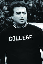 John Belushi as Bluto Blutarsky poster features a black-and-white portrait in a dark COLLEGE sweatshirt.