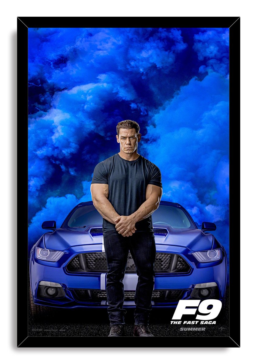 John Cena F9 framed wall art print with a black border, blue smoke backdrop, muscle car, and F9 movie title.