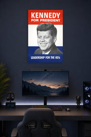 John F. Kennedy JFK Campaign Poster in a gaming desk setup above a monitor.