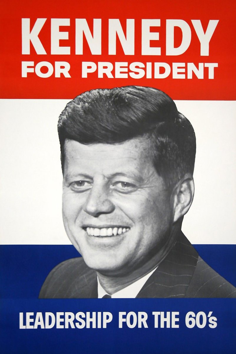 John F. Kennedy campaign poster wall art print with a smiling black-and-white portrait, red, white, and blue bands, and bold election text.