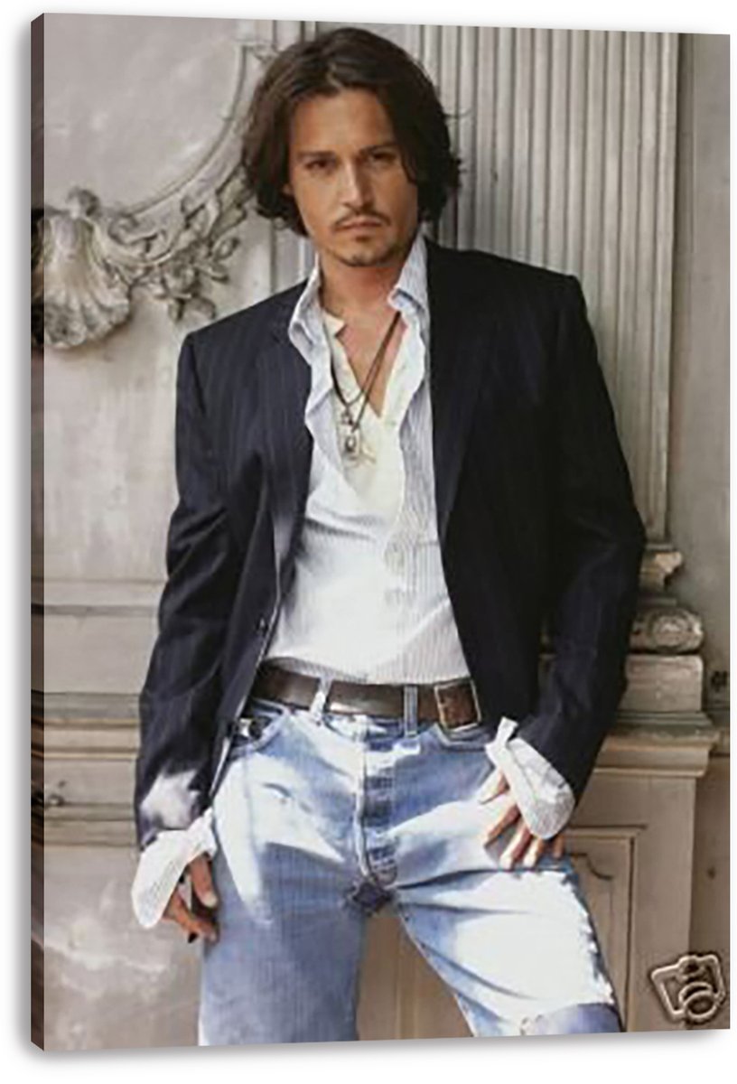 Johnny Depp canvas wall art print displays a full-length portrait in a dark jacket, layered necklaces, white shirt and faded jeans.