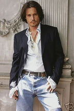 Johnny Depp wall art print portrays the actor in a dark blazer, open white shirt and jeans against an ornate stone interior.