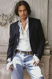 Johnny Depp wall art print portrays the actor in a dark blazer, open white shirt and jeans against an ornate stone interior.
