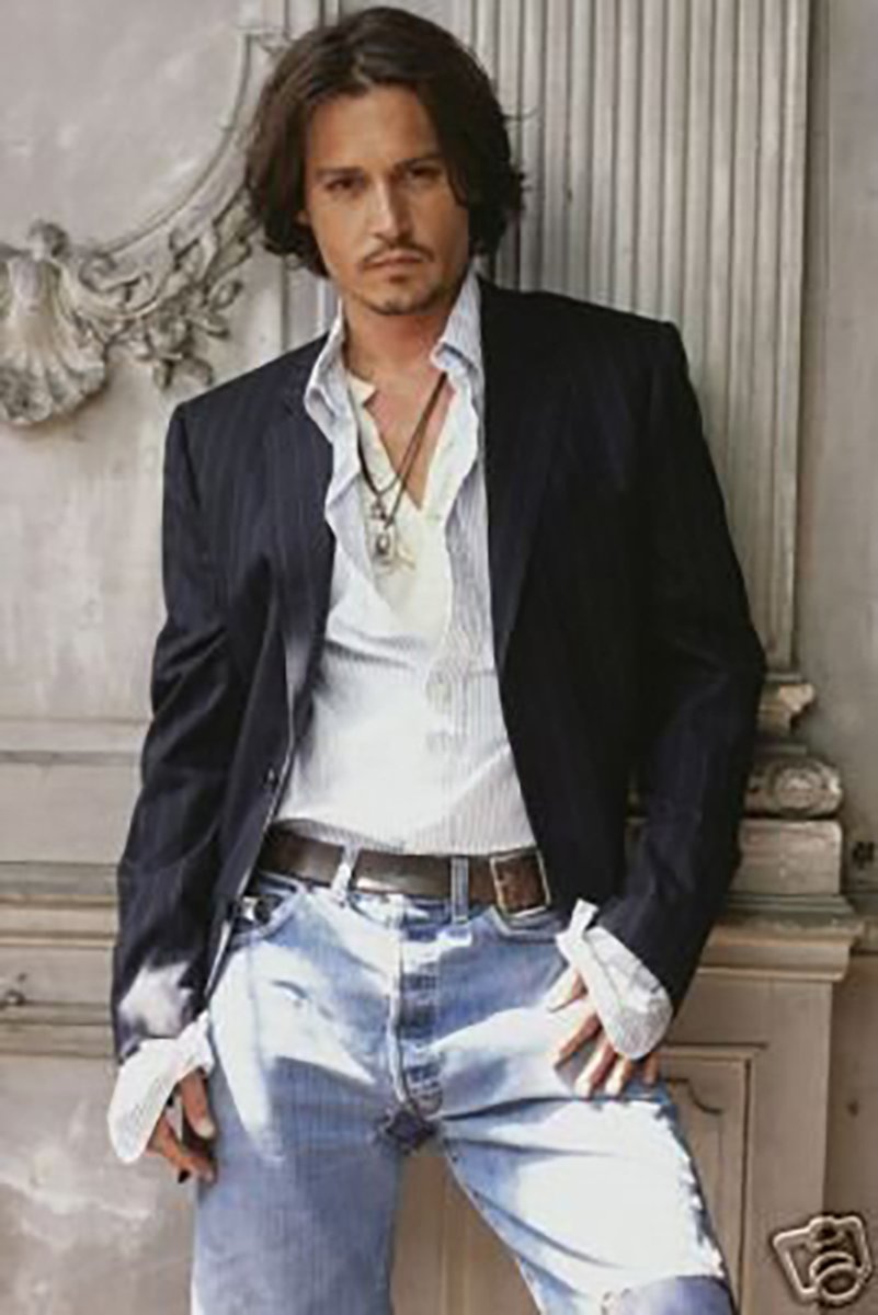 Johnny Depp wall art print portrays the actor in a dark blazer, open white shirt and jeans against an ornate stone interior.