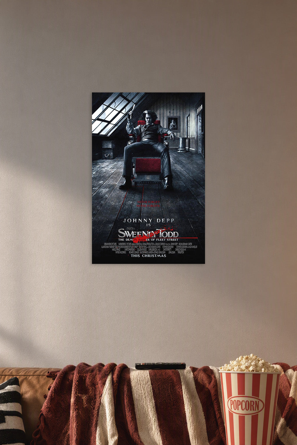 Johnny Depp Sweeney Todd in a cozy movie room above a brown sofa with popcorn.
