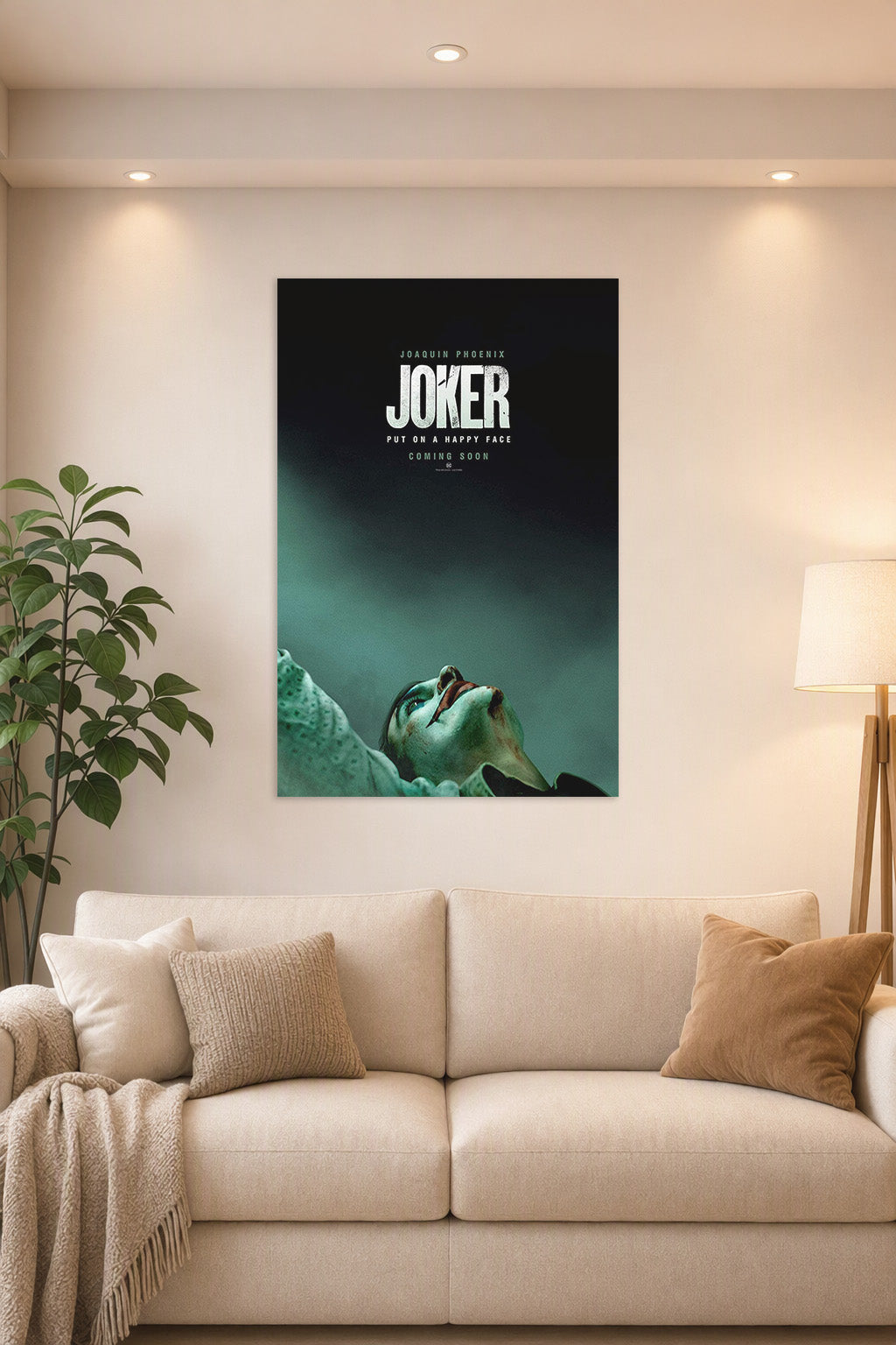 Joker (Joaquin Phoenix) in a bright living room above a beige sofa.