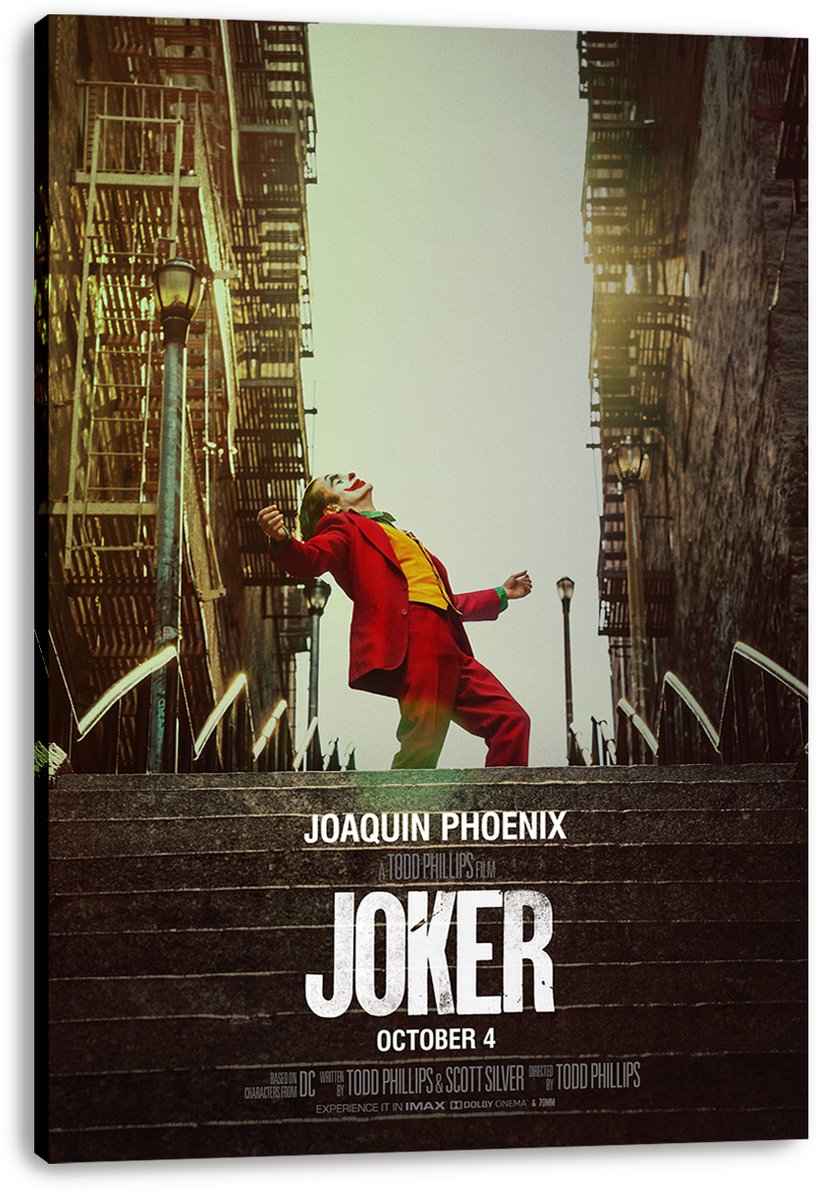 Joker movie canvas wall art print with Joaquin Phoenix in clown makeup dancing on city stairs, displayed with wrapped edges.