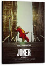 Joker canvas wall art print displays Joaquin Phoenix in clown makeup dancing on urban stairs, with the film title below.